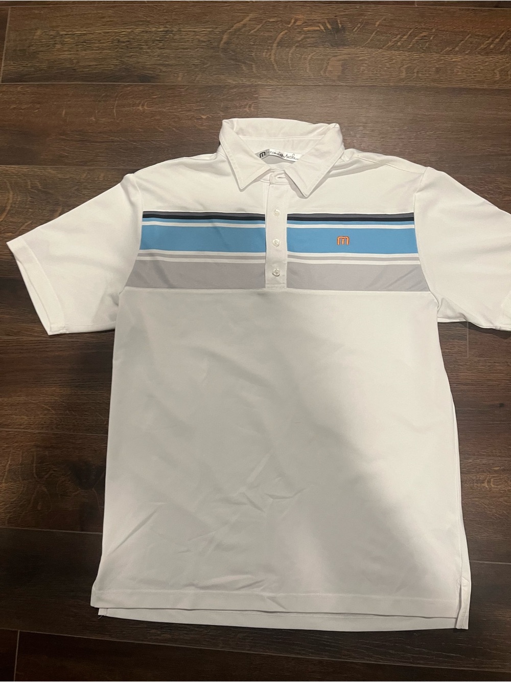 Travis Mathew White Polo with Blue and Gray Chest Stripes